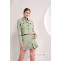 Veste femme vert olive et mini jupe plissée